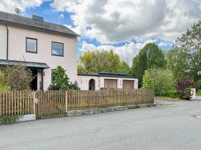 Solide Doppelhaushälfte mit Wintergarten – ideal für Selbstversorger in Trogenau