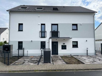 Geschmackvolle 2-Raum-Wohnung mit gehobener Innenausstattung und Balkon in Erzhausen - Bj 2023