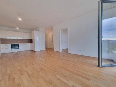 Neuwertige Wohnung mit Südbalkon, DAN-Küche und Freizeitangebot – Nähe U-Bahn