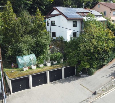 1 Familienhaus mit Einliegerwohnung und 4 Garagen inklusive Grundstück sowie großzügigem Baufenster