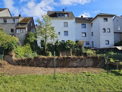 Mehrfamilienhaus mit 4 Wohneinheiten, Garten & Garage – Renditeobjekt