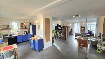 Einzigartige Loft-Wohnung im Erdgeschoss – Wohnen mit Naturblick und Dachterrasse