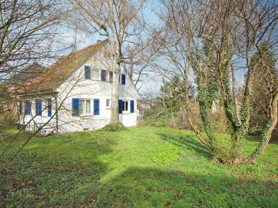 Gestalten Sie Ihr Zuhause neu: ein großes Grundstück mit viel Potenzial wartet auf Sie!