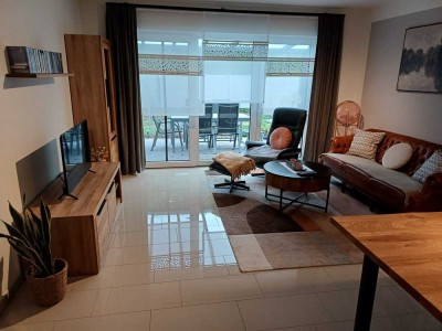 Moderne 3-Zimmerwohnung im EG mit Terrasse und Beet, 85 qm, Garage und Stellplatz