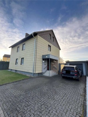 Gepflegtes 2-Familienhaus mit viel Bauland in Kusenbaum!