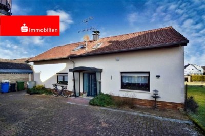 Einfamilienhaus mit großem Grundstück in Langstadt