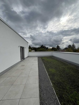 Charmante 2-Zimmerwohnung mit großer Dachterrasse