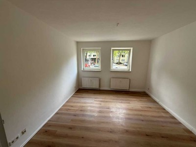 Frisch renovierte 3-Zimmer-Erdgeschoss-Wohnung mit eigenem 50 m² Garten – Toplage