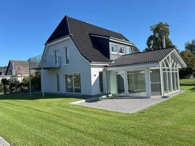 Untergeschosswohnung mit Wintergarten & Terrasse – Erstbezug nach energetischer Sanierung