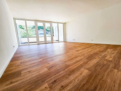 ERSTBEZUG: 4-Zimmer-Neubauwohnung mit hervorragendem Grundriss, neuer Einbauküche und Südbalkon