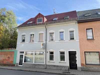 Wohn- und Geschäftshaus in Stadtnähe