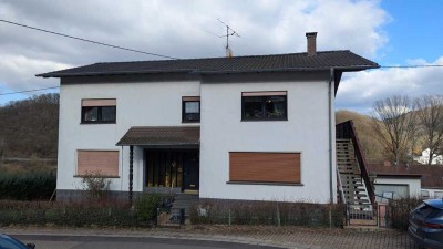 Vielseitiges Dreifamilienhaus in Überlosheim – Ideal für Investoren und Eigennutzer