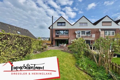 Raumwunder in Halstenbek | teilsaniertes Endreihenhaus mit Kaminofen, Balkon, Keller, Garage uvm.
