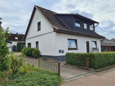 Zweifamilienhaus mit Innenhofcharakter, Werkstatt & Dachterrasse in ruhiger Lage nahe des Höpen
