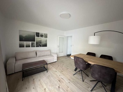 Möbliert  & Erstbezug: Exklusive 3-Raum-EG-Wohnung mit großem Balkon