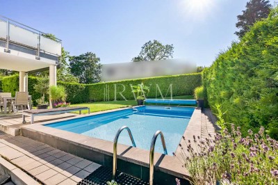 Traumhaftes Einfamilienhaus mit schönem Garten, mediterranem Flair + Pool in begehrter Halbhöhenlage