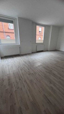 Elegante Erdgeschosswohnung mit hohen Decken und Charme.