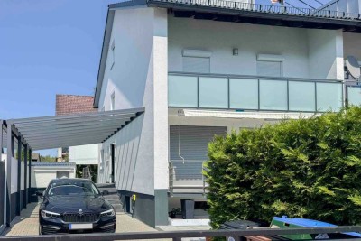 Gepflegte Doppelhaushälfte mit Garten, Carportstellplatz und 2 Freistellplätzen in Karlsfeld