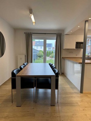 Vollständig renovierte 3-Zimmer Erdgeschosswohnung mit großem Garten und Schwimmteich