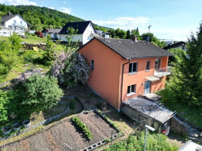 Grüne Oase: Einfamilienhaus in Ortsrandlage mit herrlichem Fernblick