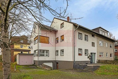 Dreifamilienhaus mit Garten und zwei Garagen in Bonn-Beuel zu verkaufen