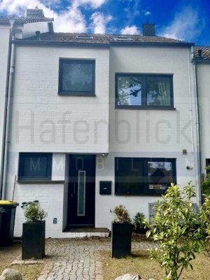 Modernes Reihenhaus mit Split-Level-Architektur in begehrter Lage von Ammersbek