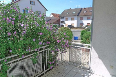 Sehr schöne Wohnung mit Einbauküche, Garage, Balkon und Gartenanteil