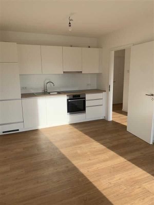 Single-Wohnung mit Terrasse und Einbauküche im Erdgeschoss