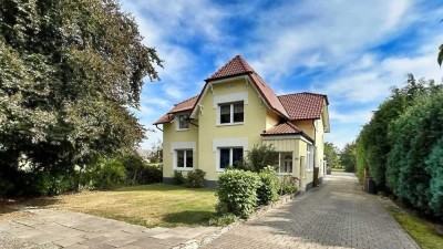 Charmantes Einfamilienhaus mit Geschichte, Charakter und großem Grundstück!