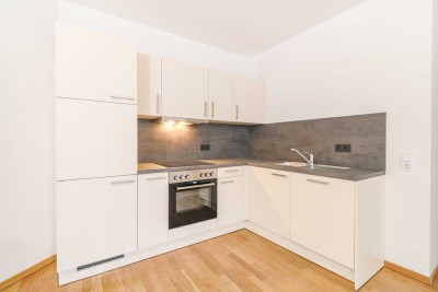Elegant + Modern -  2-Zi.-Erdgeschoss-Wohnung mit Loggia und EBK in "Erstbezug"!