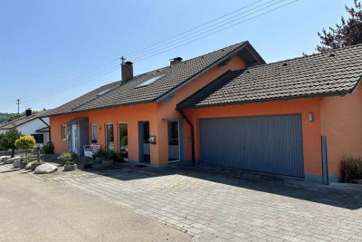 Attraktives MFH mit 3 Einheiten, Autohalle, Garage, Carport, Wintergarten mit TOP-Rendite & Optionen