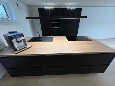 Attraktive 4-Zimmer-Souterrain-Wohnung mit EBK in Haschbach