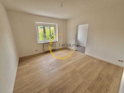 Singlewohnung in grüner, ruhiger Lage mit Außenstellplatz