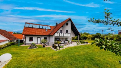 Attraktives Einfamilienhaus mit moderner Technik, großem Garten und nachhaltiger Energieversorgung