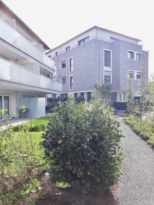 Moderne Single- oder Paarwohnung mit Terrasse ins Grüne