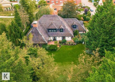 Außergewöhnliche Unternehmervilla im eleganten Landhausstil mit weitläufigem Grundstück!