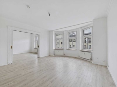 Großzügige Etagenwohnung mit 4,5 Zimmer, Balkon & Gemeinschaftsgarten - Ideal für Familien