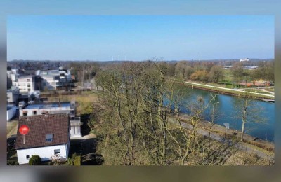 Wohnen am Kanal! Charmantes Einfamilienhaus mit großem Grundstück in erstklassiger Wohnlage!