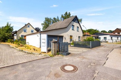 Familienfreundliches Zuhause mit Wohlfühlgarten, Garage & Dachterrasse in guter Lage !