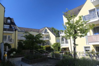 Außergewöhnliche 3,5 Zimmer Wohnung mit 2 Balkone und Tiefgaragen Stellplatz