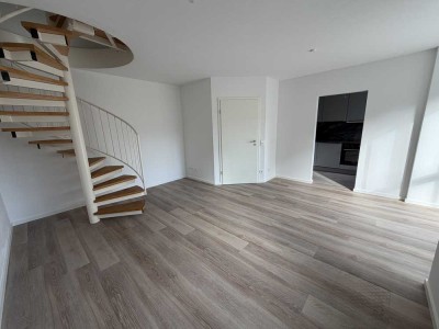 Erstbezug nach Sanierung: helle 2-Zi.-Maisonette mit Balkon in Pullach