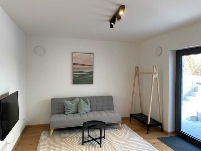 Pendlerwohnung: Möblierte 1,5-Zimmer-Wohnung inkl. Stellplatz – Erstbezug in Neunkirchen am Brand