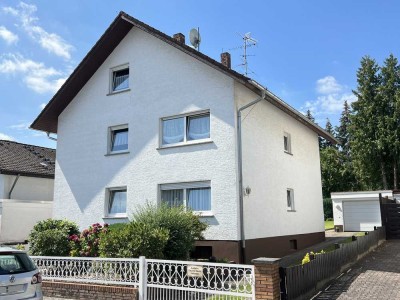 Charmantes Zweifamilienhaus mit idyllischem Garten in ruhiger Lage von Rödermark-Waldacker!