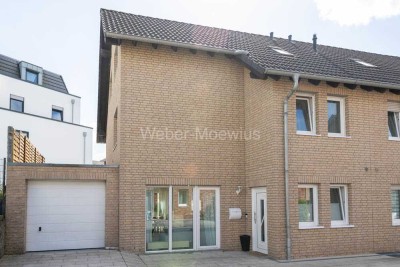 **FAMILIENHAUS** Gepflegte Doppelhaushälfte, 5 Zimmer, Südwest-Terrasse und Garage