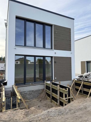 Moderne, energieeffiziente 2-Zimmer-Whg. mit Stellplatz und Garten