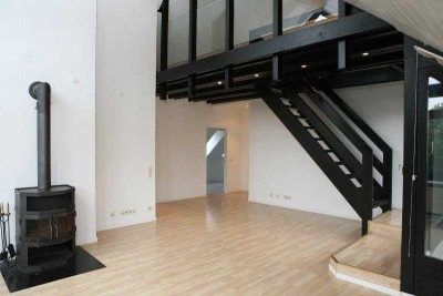 Exklusive, lichtdurchflutete 2,5-Zimmer Galeriewohnung mit Dachterrasse und Kamin