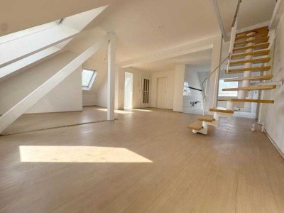 In privilegierter Lage wohnen: Charmante Maisonette -Wohnung mit großem Garten.
