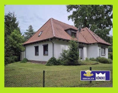 Walmdach Winkelbungalow mit Teilkeller, Doppelgarage, in begehrter Lage in Fahrenhorst