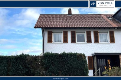 Gepflegtes Zweifamilienhaus mit eingewachsenem Garten in angenehmem Wohnumfeld
