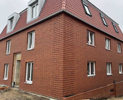 Neubau: 3 Zimmer-Wohnungen in Grevens Innenstadtlage mit Balkon mit Blick ins Grüne